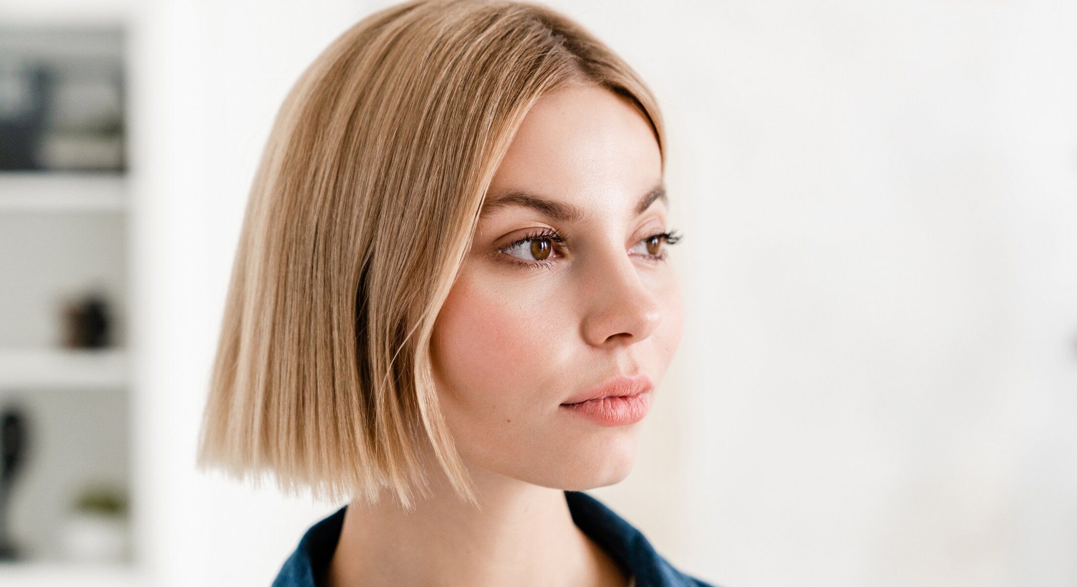 Profile view of a woman with short hair.